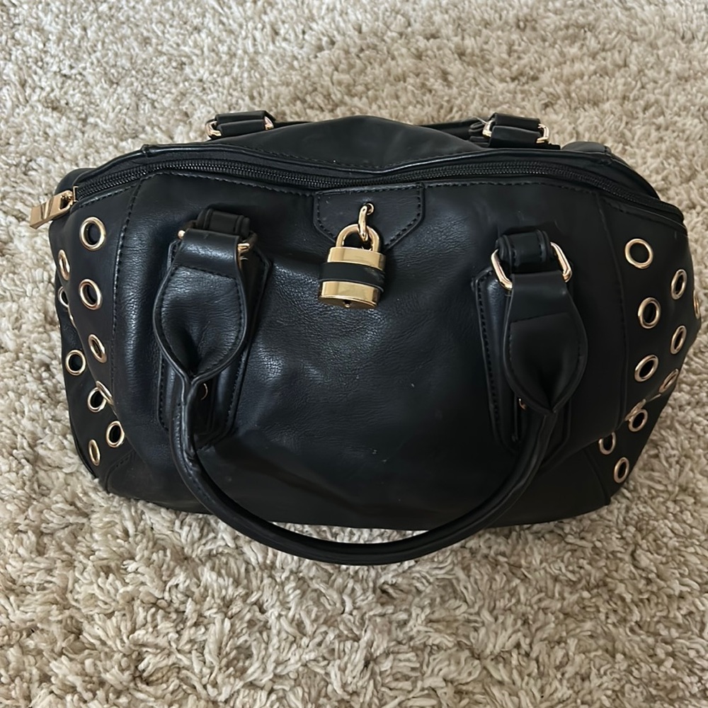 Black and Gold Grommet Handbag with Gold Lock Accent